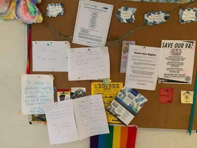 Damaged bulletin board still in use